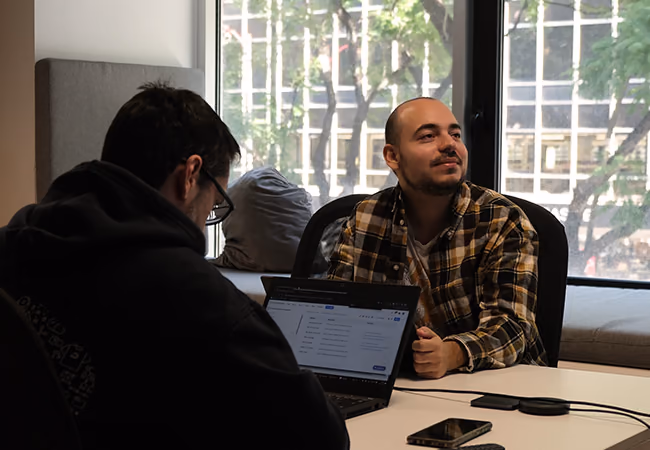 Premium Minders looking happy and focused working on the project