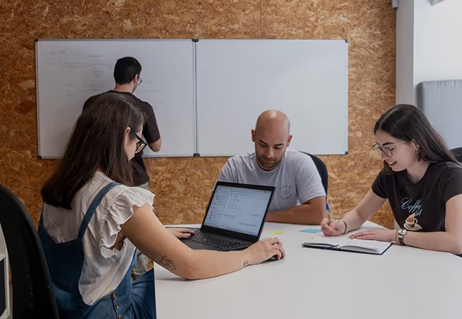 Premium Minders looking happy and focused working on the project